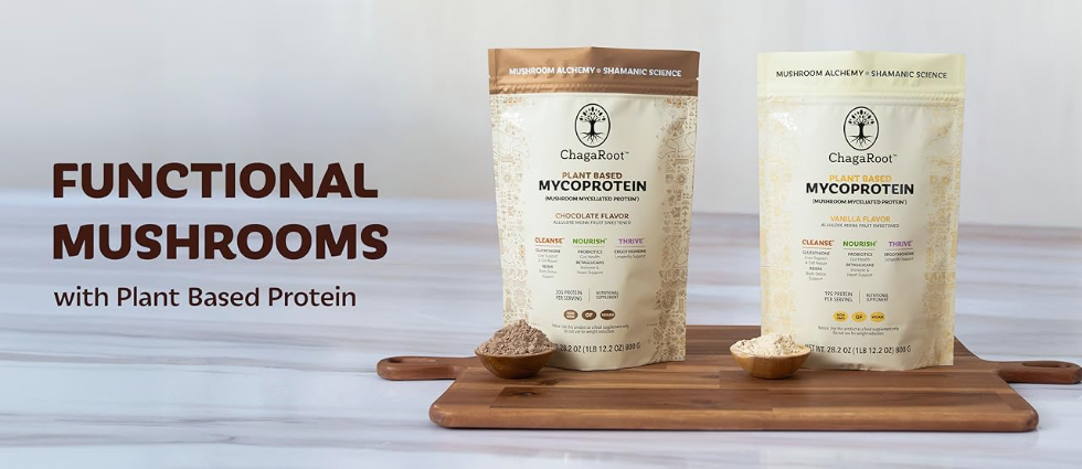 Two packages of ChagaRoot MycoProtein on a wooden board with text about functional mushrooms and plant-based protein. 
Per serving is
25g of mushrooms (chaga, turkey tails, reishi, lions mane, shiitake)
19g-20g of plant based protein
Perfect for workout recovery, smoothies, mushroom coffee creamer, and more.